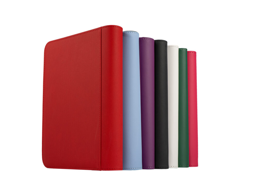 Collection of premium collector binders in red, blue, purple, black, white, green, and pink