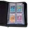 Binder page with PSA graded trading cards