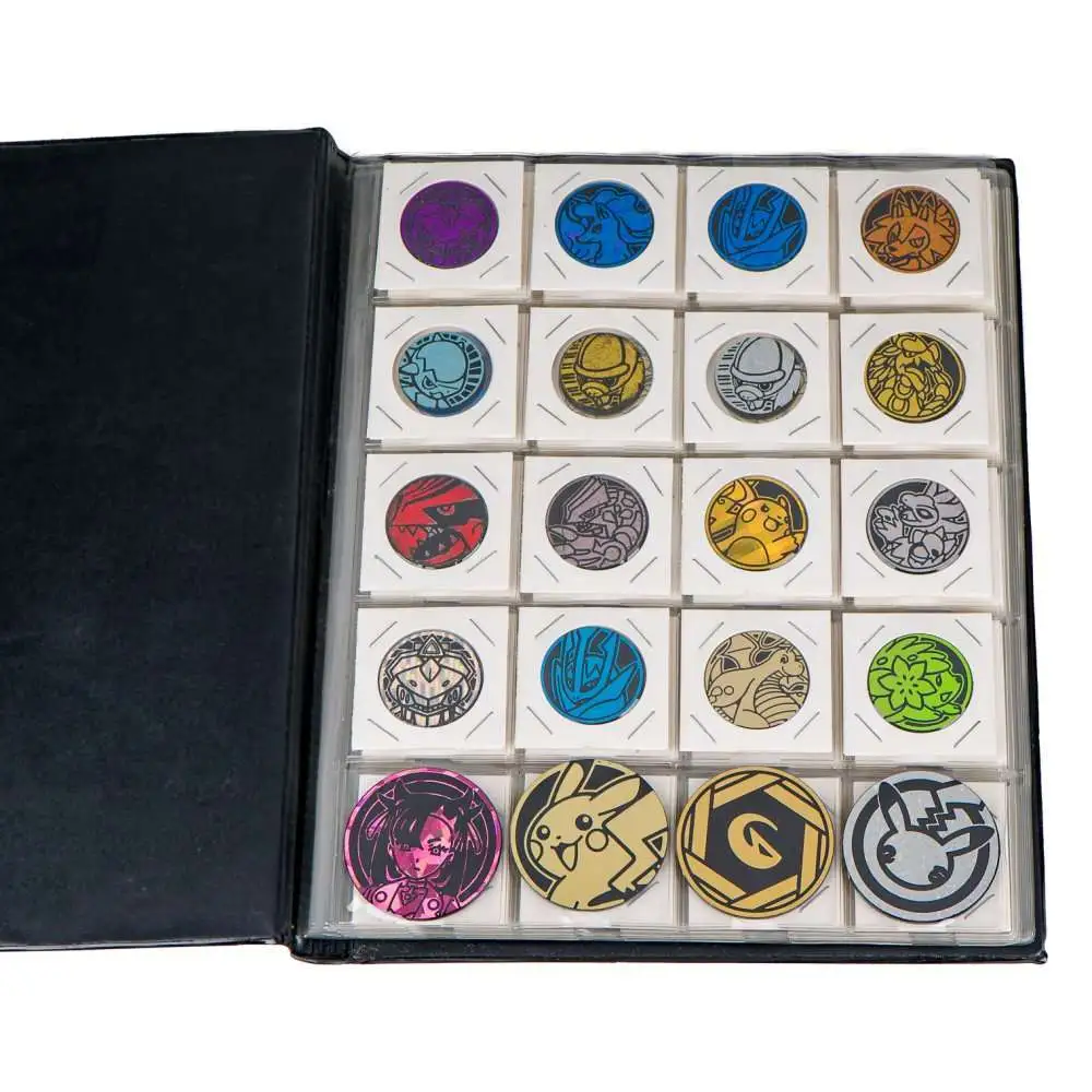 Coin Binder page with Pokémon coins in cardboard coin holders